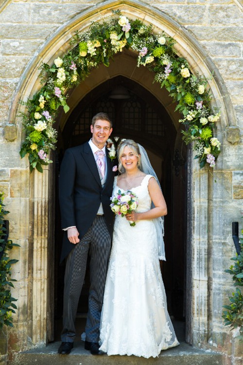 Bridge and Groom in doorway