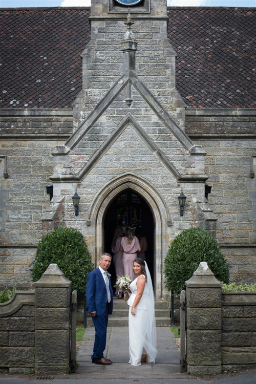 bridge and dad at church door